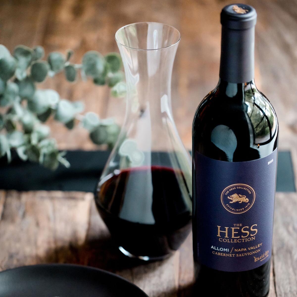 Lifestyle image of bottle decanted into carafe