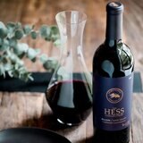Lifestyle image of bottle decanted into carafe